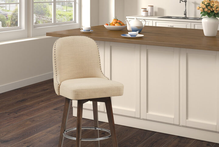 Add a fresh splash of color and style to your dining area with the Madison Park Kobe Counter Stool with Swivel Seat. The tight tufted back and seat are upholstered in a polyester and acrylic fabric that coordinates beautifully with the walnut wood finish on the straight legs. An attached seat cushion provides exceptional comfort and features a swivel function that rotates 360 degrees. The polished silver nail head trim and polished silver finish on the footrest adds an elegant accent to the design