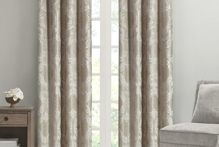 Our SunSmart Amelia Knitted Jacquard Paisley Total Blackout Grommet Top Curtain Panel adds the perfect touch of traditional elegance to your home. This total blackout champagne curtain features an intricate paisley design on a heavy textured jacquard fabric