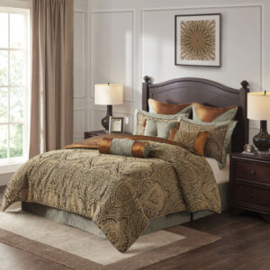 Sleep well in this exquisite Hampton Hill Canovia Springs Jacquard Comforter Set. This beautiful comforter set features an all over medallion jacquard design in rich colors of blue and soft brown in a unique weave to let the pattern shine. This oversized comforter includes 2 matching shams and a coordinating adjustable bed skirt to create a luxurious traditional look. Also included are 2 Euro shams (3 in King) that gorgeously pair with the comforter