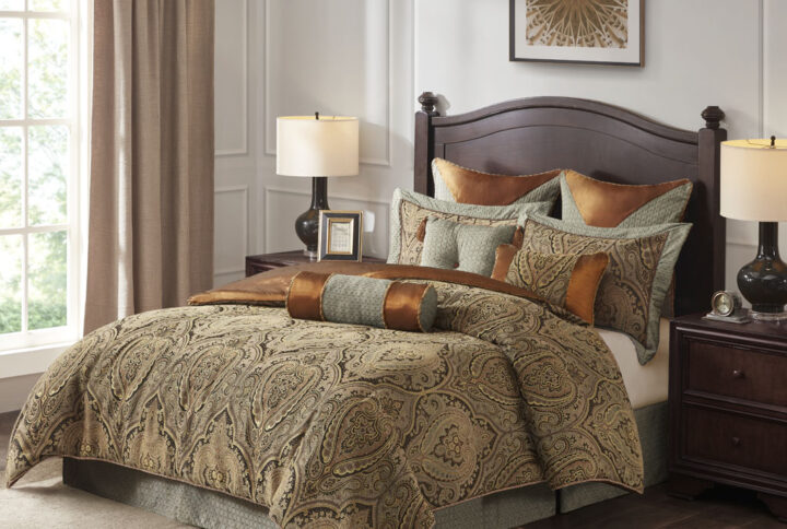 Sleep well in this exquisite Hampton Hill Canovia Springs Jacquard Comforter Set. This beautiful comforter set features an all over medallion jacquard design in rich colors of blue and soft brown in a unique weave to let the pattern shine. This oversized comforter includes 2 matching shams and a coordinating adjustable bed skirt to create a luxurious traditional look. Also included are 2 Euro shams (3 in King) that gorgeously pair with the comforter