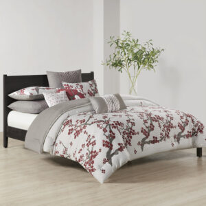 Create an oasis out of your space with the Natori Cherry Blossom Bedding Collection. This elegant comforter mini set features a 100% cotton sateen face with a diamond patterned ground and blooming cherry blossom branches inching up to the top and reverses to a 100% cotton percale heather grey tone of the same diamond pattern print for a dramatic feel. The set is machine washable for easy care and includes one oversized and overfilled comforter and two shams. Complete the look with the coodinating bedding accessories