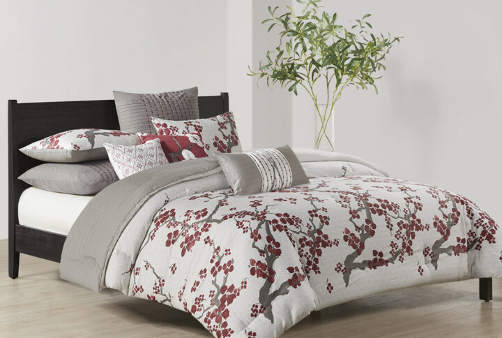 Create an oasis out of your space with the Natori Cherry Blossom Bedding Collection. This elegant comforter mini set features a 100% cotton sateen face with a diamond patterned ground and blooming cherry blossom branches inching up to the top and reverses to a 100% cotton percale heather grey tone of the same diamond pattern print for a dramatic feel. The set is machine washable for easy care and includes one oversized and overfilled comforter and two shams. Complete the look with the coodinating bedding accessories