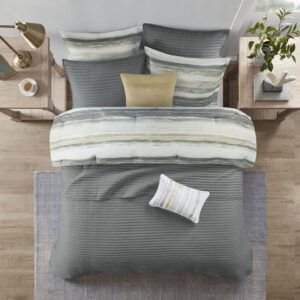 for a serene look. The included quilt features channel stitch quilting pattern and its gray color complements the bedding set. Two shams mirror the design on the face of the comforter