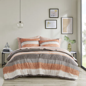 Revamp your bedroom style with the Madison Park Essentials Jaxon bed in a bag. This modern comforter set features a stripe pattern in alternating coral