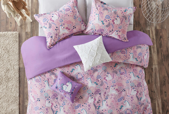 Add a touch of whimsy to your child’s bedroom with the Urban Habitat Kids Lola Unicorn Cotton Duvet Cover Set. Adorable unicorns prance across the top of the duvet cover and matching shams (1 for Twin Sizes) in bright colors. The solid reverse highlights the fun print on the duvet cover