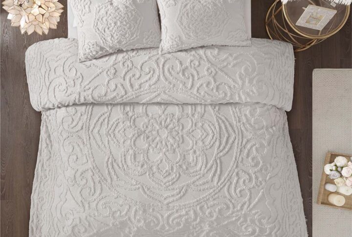 The Madison Park Laetitia Tufted Cotton Chenille Medallion Duvet Cover Set provides an alluring shabby chic update to your bedroom. This globally inspired duvet cover features a 100% cotton face and reverse with a tufted chenille medallion centered on top of the bed. The 2 matching shams (1 in Twin/Twin XL) coordinate with the cotton duvet cover to complete the boho look. Perfect for all season use