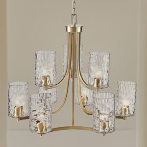 Introducing the Opulentia 9 Light Chandelier by Hampton Hill. This transitional style chandelier adds a modern touch with its sleek antique brass finish