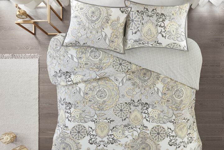 Refresh your bedroom with the Madison Park Isla 3 Piece Cotton Printed Reversible Duvet Cover Set. The 100% cotton duvet cover and shams flaunt a botanical floral design with a medallion motif printed in soft watercolor hues. A printed pattern on the reverse complements the top of the bed