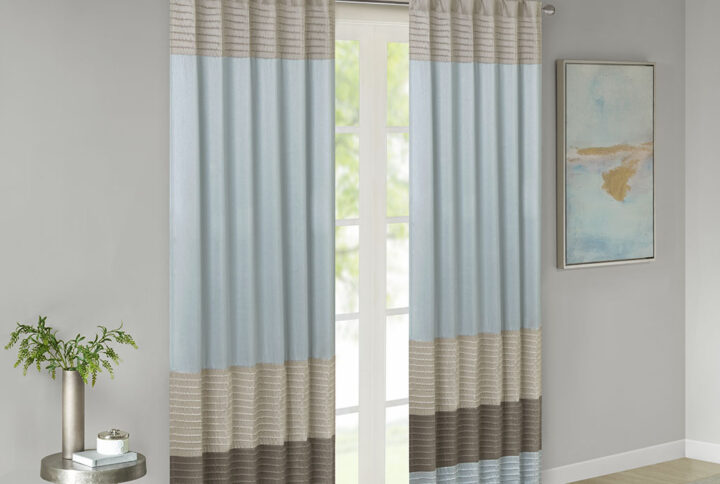 Madison Park Amherst Polyoni Pintuck Window Curtain is a simple way to add style to your room. This window panel features a modern striped design in subtle hues of blue