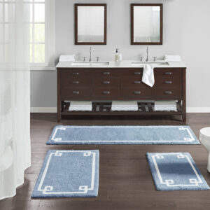 The Madison Park Evan Cotton Tufted Bath Rug provides the perfect balance of comfort and style to update your bathroom. This tufted bath rug features a contrasting white border on a soft colored ground creating a clean hotel look