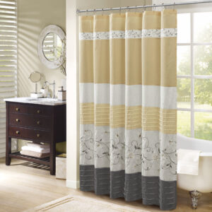 Add an elegant addition to your bathroom with the Madison Park Serene shower curtain. Its soft yellow pairs with delicate embroidery for the perfect combination. This 72x72" shower curtain is machine washable for easy care.Complete the look with coordinating bedding available and sold separately.