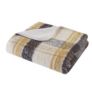 this cozy throw is the perfect accessory to elevate your comfort. The timeless plaid pattern adds a touch of rustic charm