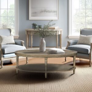 Experience sophistication with the Ayanna Oval Coffee Table from Martha Stewart’s Bedford Collection. The oval shape not only adds a touch of elegance but also ensures smooth lines and flow in your living space. Coupled with a distinctive raised edge