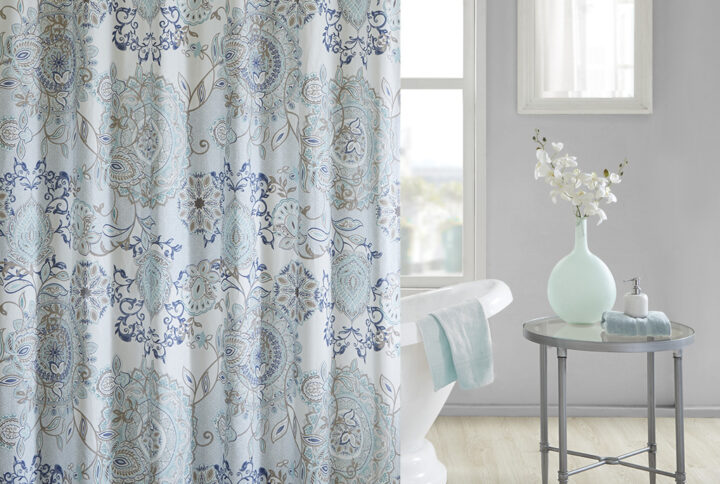 Refresh your bathroom with our Madison Park Isla shower curtain. This printed shower curtain flaunts a beautiful floral and medallion motif in soft blue and neutral watercolor hues. While the 100% cotton percale base adds natural appeal for an organic touch to any decor. Machine washable for easy care