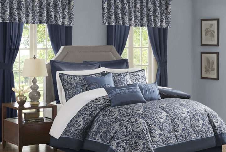 The Madison Park Essentials Brystol 24 Piece Room in a Bag provides a total makeover for your bedroom decor. This traditional comforter flaunts a navy