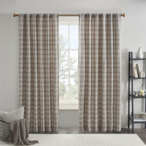 The Madison Park Anaheim Plaid Rod Pocket and Back Tab Panel with Fleece Lining is an effortlessly stylish and casual addition to your home decor