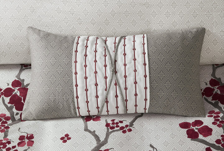 Create an oasis out of your space with the Natori Cherry Blossom Bedding Collection. This elegant oblong decorative pillows features a 100% cotton percale ground with embroidery and cording details for a finished look to this intricate collection. Dry clean for best care