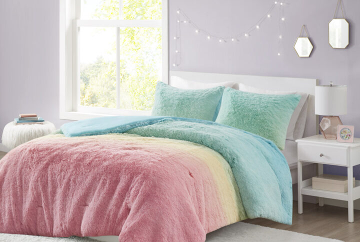 Add a cozy and stylish update to your bedroom with the Mi Zone Primrose ombre shaggy faux fur comforter set. The ultra soft comforter features a rainbow ombre shaggy faux fur that creates a fun and trendy look