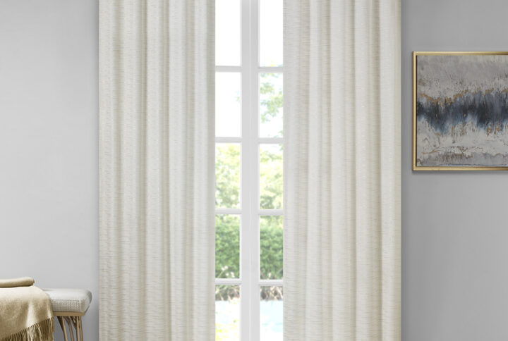 Elevate your living space with the 510 Design Colt Poly Velvet Window Panel Pair. Crafted from soft