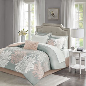 Transform your bedroom into a comfortably casual retreat with the Madison Park Essentials Maible Complete Comforter and Cotton Sheet Set. A beautiful printed floral design