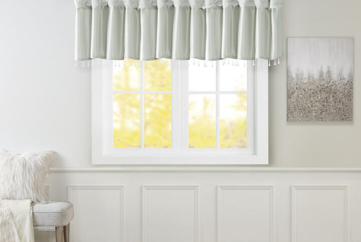 Give your home a decorator’s touch with the Madison Park Emilia Window Valance. Made from a faux silk fabric