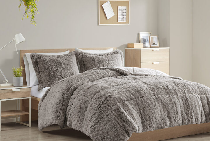 The Intelligent Design Malea Shaggy Long Fur Comforter Mini Set brings a soft contemporary update to your bedroom. The comforter and shams (1 in Twin/TwinXL) feature stylish shaggy faux fur that creates a soft fluffy texture and modern look. The solid plush reverse adds a soft and warm touch. Items in the set may come in a rolled or compressed packaging