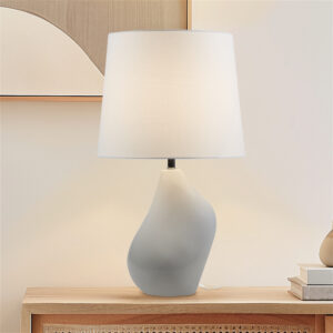 Illuminate your space with the Ink + Ivy ZenGlossy Table Lamp! Embracing a modern artisanal design