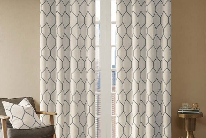 The Madison Park Brooklyn Window Panel provides a stylish and modern update for any room. A grey metallic geo pattern is embroidered on a natural textured fabric