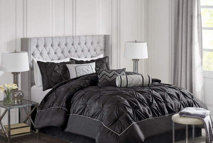 This beautifully tufted bed is from the Laurel Bedding Collection. Its gorgeous