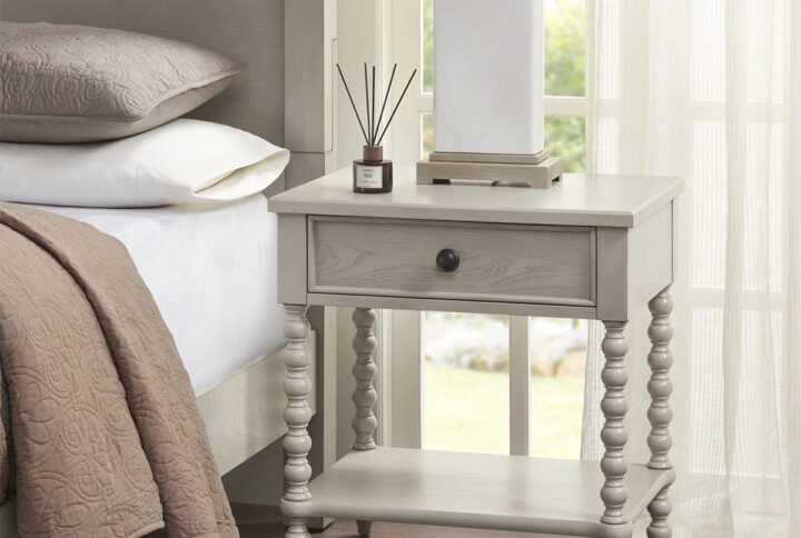 Complement your bedroom space with the Madison Park Signature Beckett Nightstand. This nightstand table features a natural whitewash finish to create a warm and inviting look. A single drawer and lower shelf provide plenty of space for your bedside essentials. The turned solid wood legs add an elegant accent