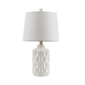 for a stunning mid-century modern look. The contours are highlighted with accenting lines to further emphasize the design. A white lamp shade softly filters the light into your room and complements the base.