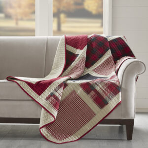 The Woolrich Huntington oversized quilted throw features a classic pieced design with a mix and match of plaids and solids. Made from 100% cotton this lightweight throw is soft to the touch and can be used year round.