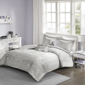 Add some shimmer and shine to your bedroom with Intelligent Design’s Zoey Metallic Triangle Print Comforter Set. Made from ultra-soft microfiber