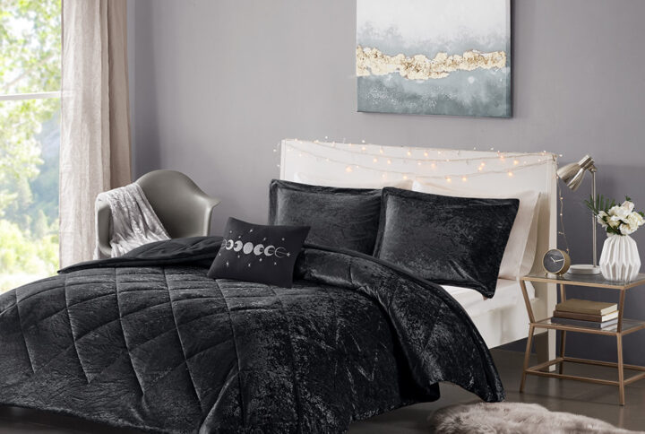 Create a luxuriously comfortable and lush bedroom space with the Intelligent Design Felicia Velvet Comforter Set. The crushed velvet