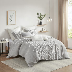 The INK+IVY Hayes 3 Piece Cotton Chambray Duvet Cover Set with Chenille brings a perfect blend modern and boho styles to your bedroom. This cotton duvet cover features chenille taping and trims