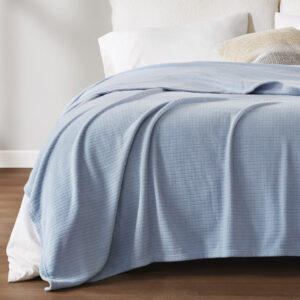 The microfleece blanket features an ultra-soft material with a subtle grid pattern to complement your decor in any room. With an anti-pilling face