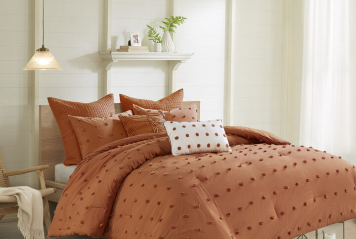 The Urban Habitat Brooklyn Cotton Jacquard Comforter Set features small tufted chenille dots that create a fresh shabby chic look. This comforter set brings a soft and charming update to your bedroom