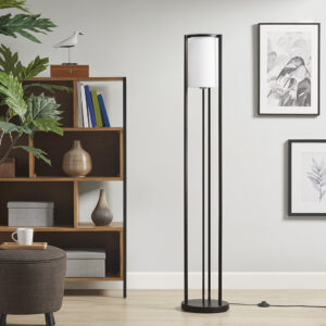 The Martha Stewart Charlton Metal Floor Lamp with Glass Cylinder Shade provides an easy way to elevate and illuminate your room. Featuring a sleek