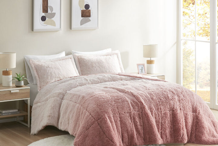 Create a cozy and comfy space with the Intelligent Design Brielle Shaggy Faux Fur Comforter Mini Set. This shaggy fur comforter features an ombre design with a soft