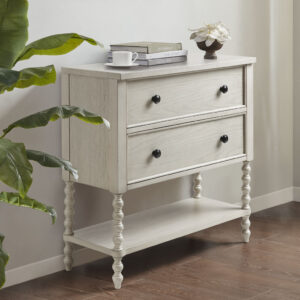 Elevate your living room with the sophisticated style of the Madison Park Signature Beckett Accent Chest. This 2-drawer accent chest features a solid wood frame and elegant turned legs