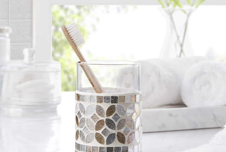 This timeless mosaic collection showcases hand-crafteded mosaic accessories to elevate your bathroom. The combination of champagne gold and silver stained glass in a floral motif reflects light beautifully and can be a luxurious centerpiece for bathroom decor. _x000D_