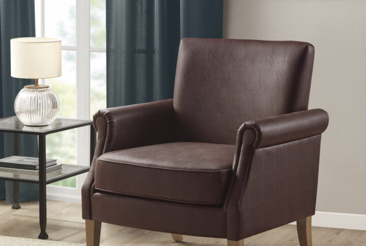 Annika faux leather chair from Madison Park with its extravagant and timeless look provides instant comfort for you