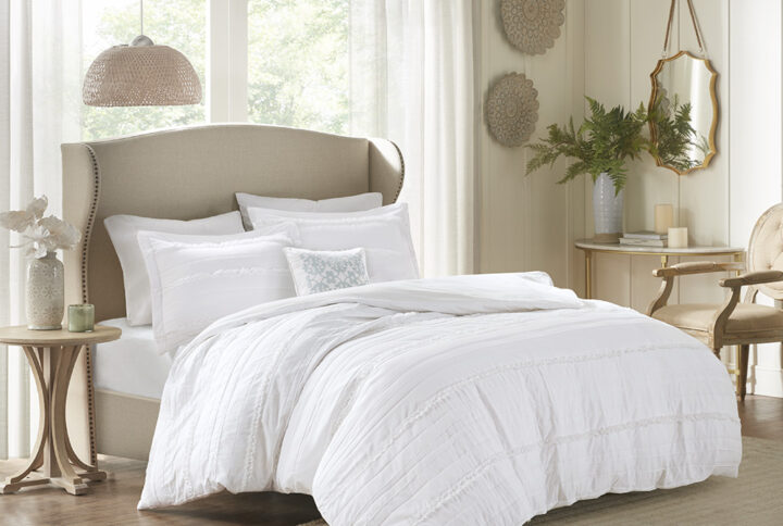 Elevate your bedroom with the Madison Park Celeste 4 Piece Microfiber 2-in-1 Duvet Set