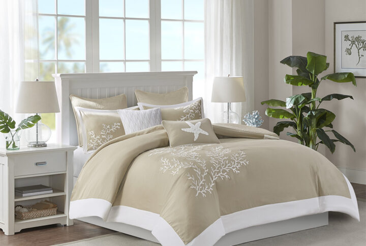 Bring a bit of sea side inspiration into your home with this beautiful bedding collection. The Harbor House Coastline collection features an intricate white coral motif embroidered on a taupe background finished with a pieced white border. Made of 100% cotton jacquard