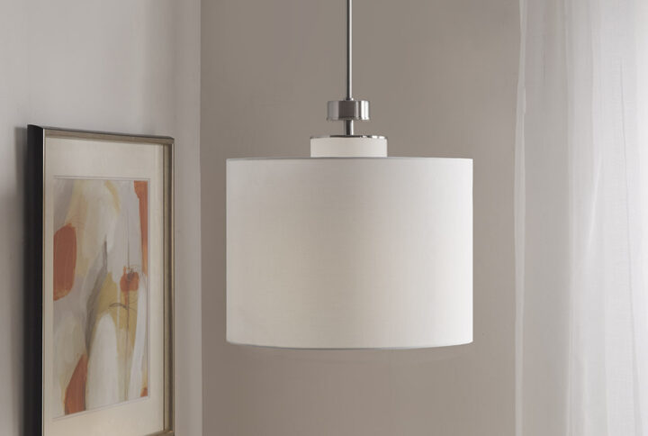 The Pacific Metal Pendant with Drum Shade is the perfect update of urban sophistication to any room. A metal and glass light diffuser is featured in a silver finish