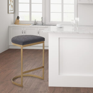 The Madison Park Maison Counter Stool offers a bold and modern update for your kitchen or dining room. This backless counter stool features a charcoal upholstered seat with an antique gold metal base