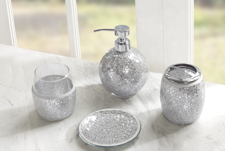 Add an alluring radiance to your bathroom with the Madison Park Mosaic 4 Piece Bath Accessory Set. Flaunting a crackle glass mosaic design