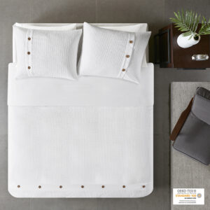 Give your bedroom a simple and clean look with the Madison Park Finely 3 Piece Cotton Waffle Weave Duvet Cover Set. The 100% cotton duvet cover and shams feature a waffle weave that creates a soft textured look and feel. Decorative wood button details add a charming and functional accent. With a fresh contemporary style