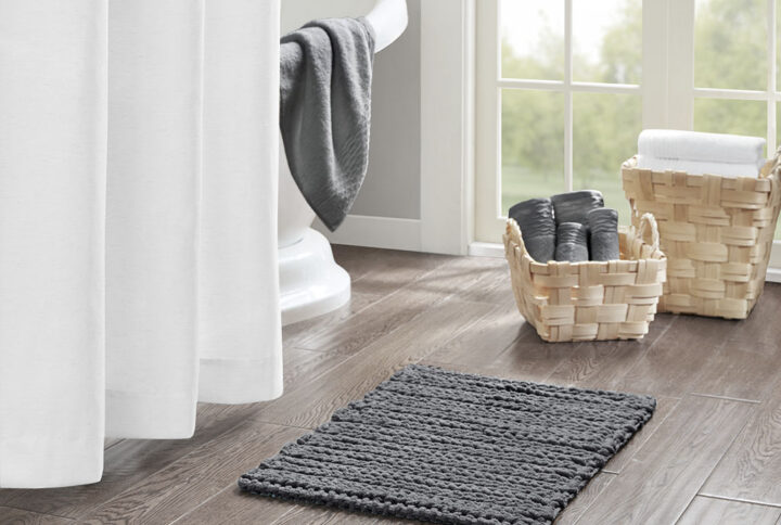 The Madison Park Lasso 100% Cotton Chenille Chain Stitch Rug provides a soft textural update to your bathroom decor. This cotton chenille bath rug features a woven chain stitch design that creates dimension and texture