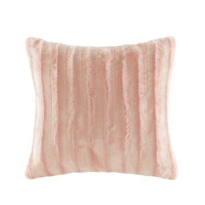 Indulge in luxury and comfort with this solid faux fur square pillow. Made from an ultra soft plush fabric